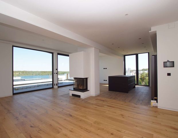 Mit dem Aufzug direkt in die Traumwohnung am Zwenkauer See! - Foto 1