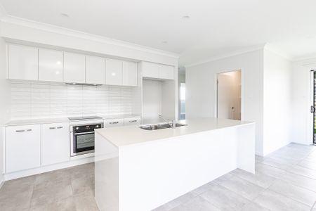 2 Tesselaris Court, Bohle Plains QLD 4817 - House For Rent | Domain - Photo 4