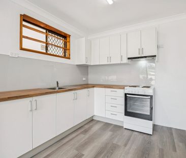 Lovingly Renovated Ground Floor Two Bedroom Unit (Water Usage & App... - Photo 4