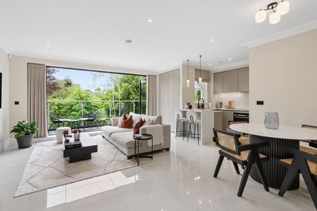 **SOLE AGENT** A new build 1st floor apartment, ideally located for Cobham train station and village centre, with 2 bedrooms, 2 bathrooms, private balconies, gated and allocated parking. - Photo 5