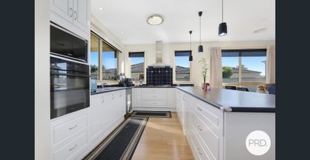 FULLY FURNISHED QUALITY FAMILY HOME WITH A POOL! - Photo 4