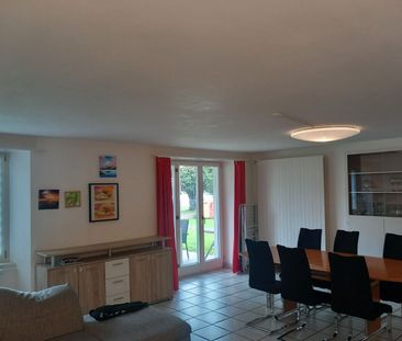 Appartement de 5,5 pièces rez-de-chaussée avec terrasse - Photo 1