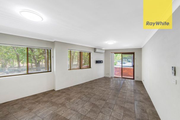 SPACIOUS AND SUN-FILLED TWO BEDROOM APARTMENT IN BOUTIQUE BLOCK - Photo 1