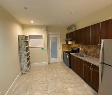 🌟 Spacious & Bright 2-Bedroom Semi-Basement Suite–Steps from SkyTrain - Photo 2