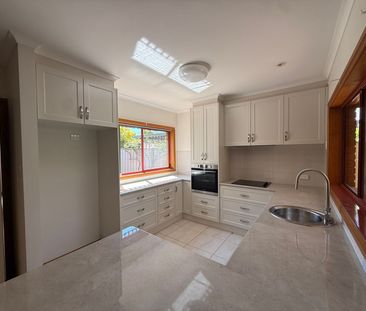 Comfortable Three-Bedroom Home - Photo 3