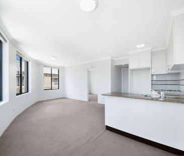 IDEALLY LOCATED APARTMENT! - Photo 1