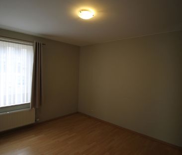 Een gezellig appartement op benedenverdieping vooraan - met garage - Photo 2