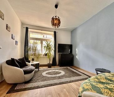 Einziehen und Durchatmen: Sanierte Erdgeschosswohnung mit privatem ... - Foto 1