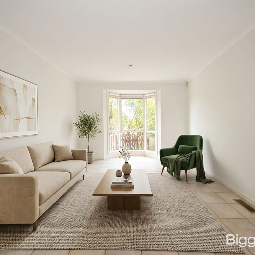 Light-Filled North-Facing Living in a Convenient Location - Photo 1