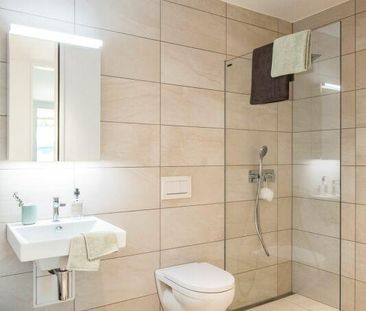 Neubau 3.5-Zimmer-Wohnung mit traumhaftem Blick in die Alpen - Foto 4