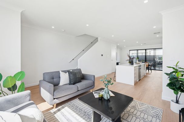 Brand New Modern 3-Bedroom Townhouse with City & Beach at Your Doorstep! - Photo 1