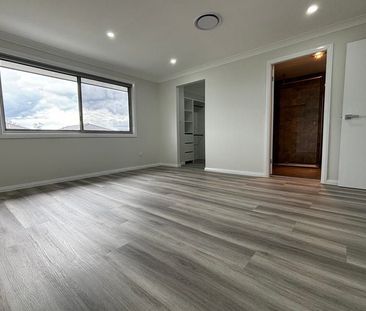 Brand New 5 Bedroom Family Home - Photo 5