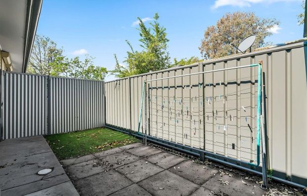 Bright, Low-Maintenance Unit in a convenient Location - Photo 1