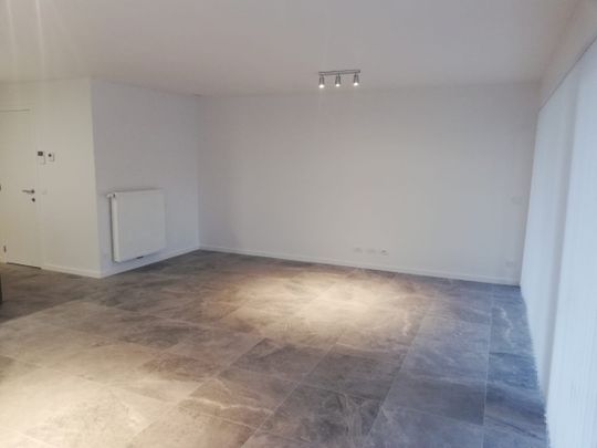 Gelijkvloers nieuwbouwappartement met 2 slaapkamers - Foto 1