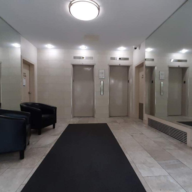 Downtown Apartment Building - Photo 1