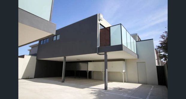 “Modern 2-Bedroom Unit with Private Courtyard & Secure Parking” - Photo 1