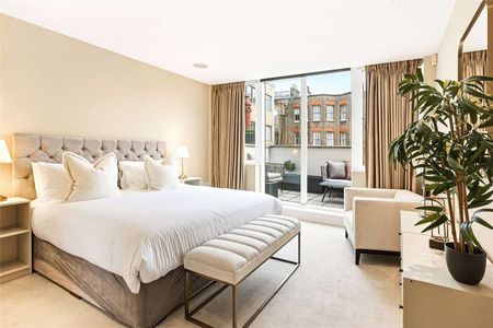 This apartment is located on the second floor of a portered building with lift service. - Photo 5