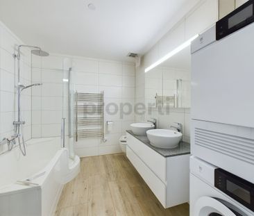 Helle 3.5-Parterrewohnung mit traumhaftem See- & Bergblick in Hause... - Photo 3