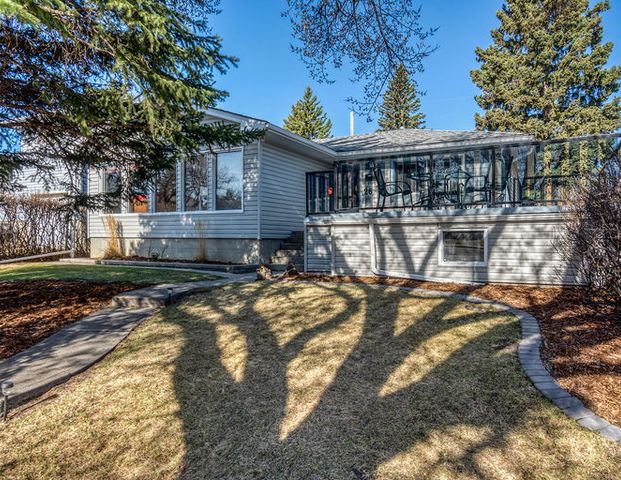 Beautiful Brentwood Bungalow - Great family home | 26 Butte Place NW, Calgary - Photo 1