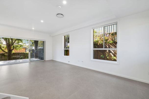 Modern Elegance Meets Spacious Living - Photo 1