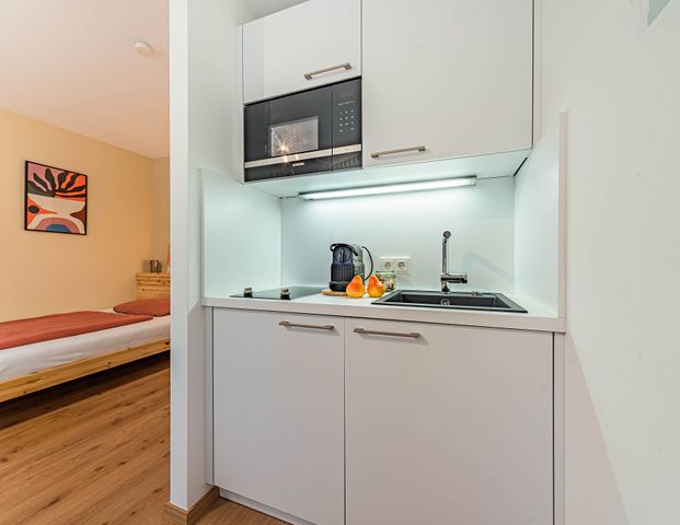 City-Residence: Gepflegtes 1-Zimmer-Apartment mit W-LAN und Reinigungsservice - Foto 1