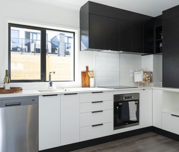 This contemporary two-bedroom, two-bathroom townhouse on Charlemont... - Photo 2