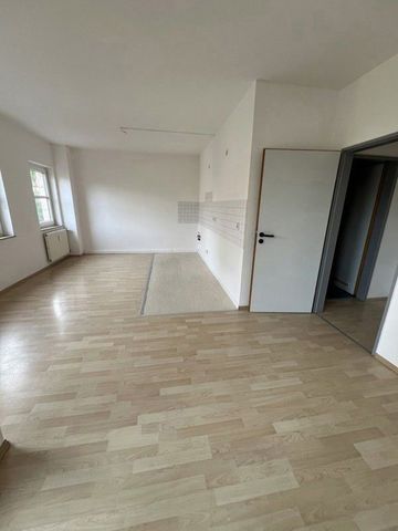 Zentrale 2-Raum-Wohnung mit Balkon und Aufzug! - Foto 4