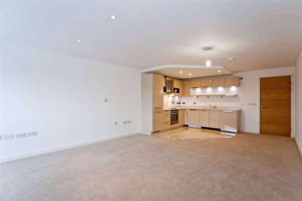 A sought after two bedroom luxury apartment with off street parking. - Photo 1