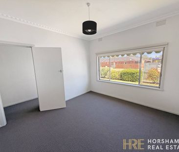 Modern Three-Bedroom Home Close to the CBD - Photo 3