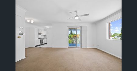 Freshly Painted, Spacious & Perfectly Positioned - Photo 2