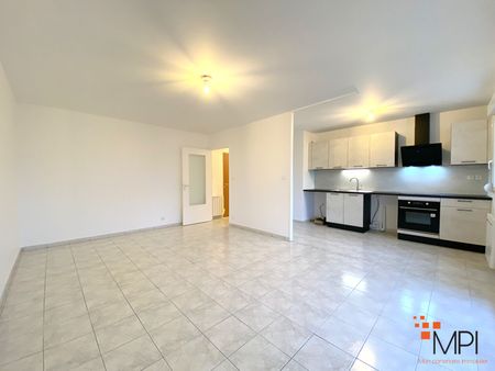 Location Appartement 3 pièces 60m² - Photo 2