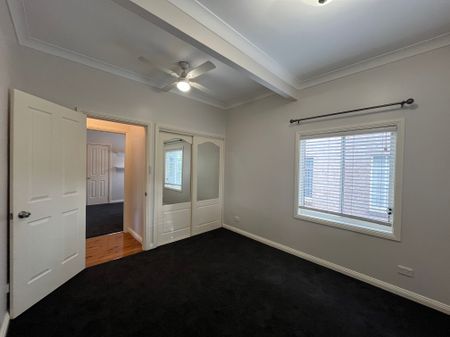 Three Bedroom Home with Sunroom - Photo 2