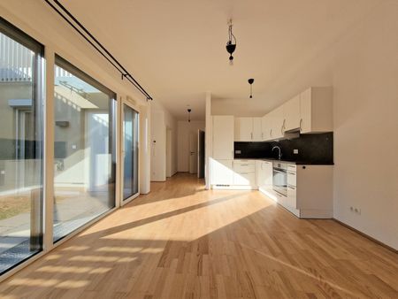 Schicke Neubauwohnung mit kl. Garten in idyllischer Ruhelage - Photo 4