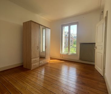 Un lumineux 3 pièces avec un balcon Avenue des Vosges - Photo 1