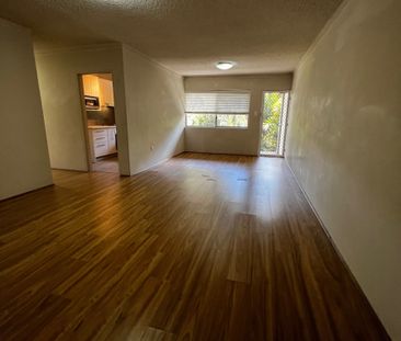 Bright Two Bedroom Unit in an Unbeatable Location! - Photo 1