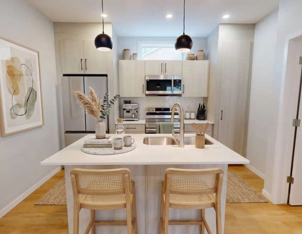 3-Bedroom Main Floor Living in the Heart of 124 Street District — 3 Bedrooms Townhouse - Photo 1