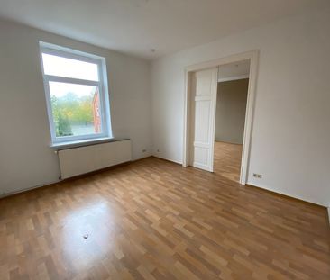 Moderne 4-Zimmer-Wohnung mit großem Balkon in zentraler Lage! - Photo 3