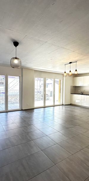 Light, comfort and an ideal location! - Photo 1