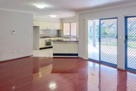 Oversized Two Bedroom Unit in Highly Convenient Locale - Photo 4