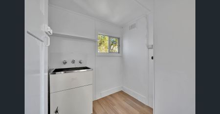 Stylish Renovation with Indoor Comfort and Outdoor Charm - Photo 4