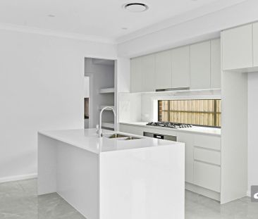 Modern Light-Filled Home with Ground Floor Living and Quality Finishes - Photo 5