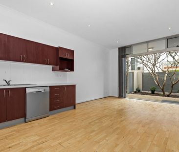 Modern One-Bedroom Apartment with Private Courtyards in the Heart o... - Photo 2