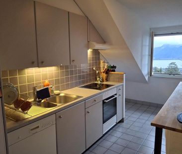 Bel appartement de 3 pièces situé au dernier étage avec vue sur le lac - Foto 5