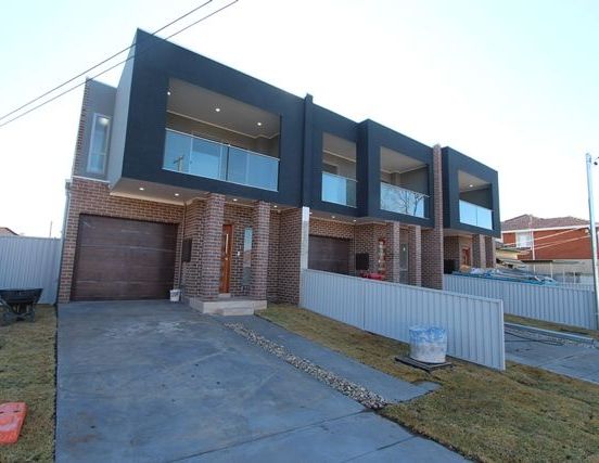 NEAR NEW TRIPLEX!! - Photo 1