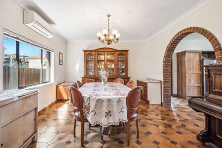 Spacious Full-Brick Home with Large Garage and Prime Punchbowl Location - Photo 2