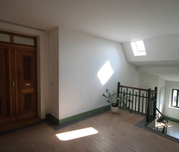 Tolle Dachgeschosswohnung mit großem Balkon - Foto 4