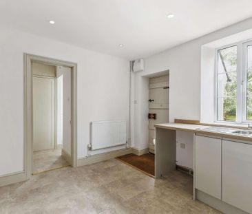 An idyllic three-bedroom fully refurbished cottage located on the B... - Photo 3