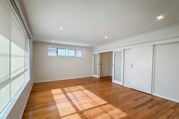 Stylishly Renovated Two-Bedroom Residence with Exclusive Street Frontage - Photo 1