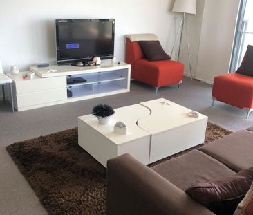 STUNNING INNER CITY FURNISHED UNIT IN SECURED COMPELX WITH WATER VI... - Photo 1