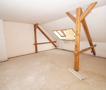 4-Zimmer-DG-Wohnung mit Balkon – Erstbezug nach Sanierung - Foto 1